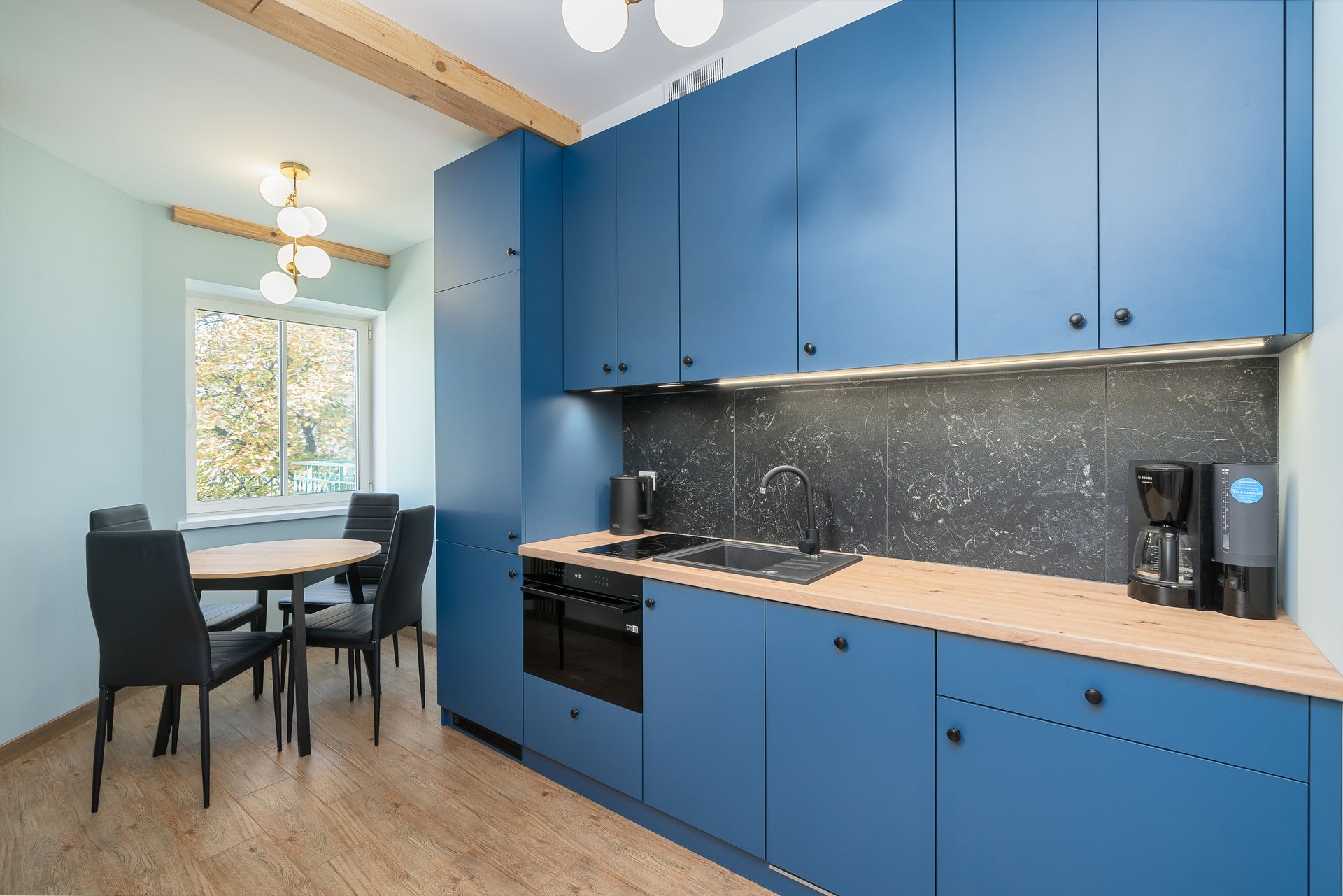 A calm blue modular kitchen