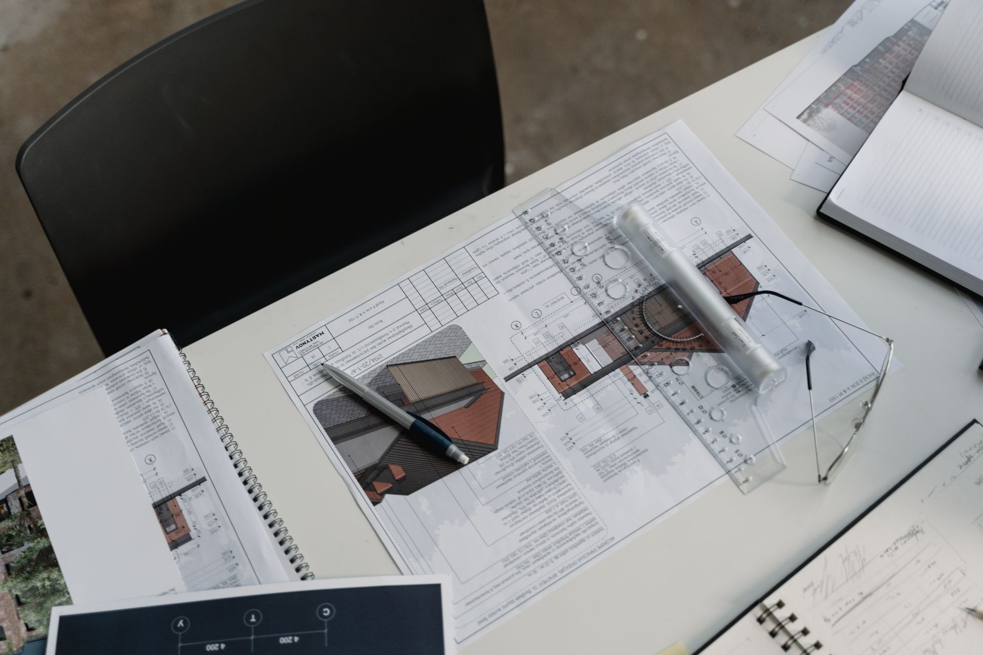 Architectural floor plans and drafting tools: review the complete layout before discussing room orientation and personal Vastu preferences.